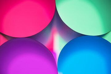 Paper shape in mysterious circle in multicolored light