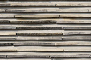 wall made of carved marble bricks