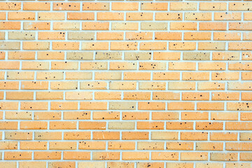 Light apricot color and dark apricot color mixed brick construction