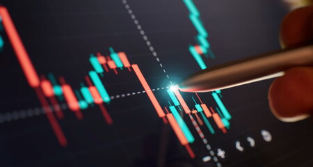 Price chart and pen indicator on screen, red and green candlestick chart on blue screen theme,...