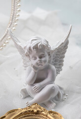 Plaster statue of little angel