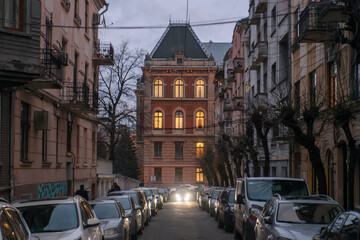 Street with ancient buildings in the historical part of Chernivtsi, Ukraine. December 2021