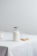 Fresh Milk on the table with white tablecloth