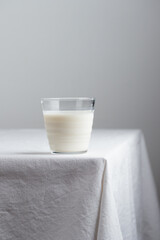 Fresh Milk on the table with white tablecloth