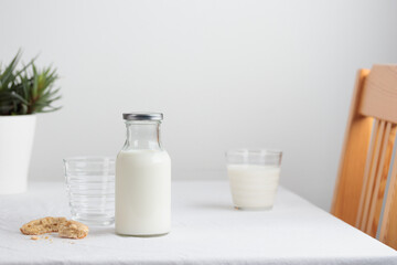 Fresh Milk on the table with white tablecloth