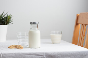 Fresh Milk on the table with white tablecloth