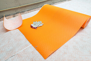 Home renovation. Polyethylene drainage membrane with fiber fabric that separates the substrate and...
