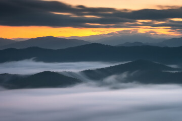 Fototapeta na wymiar Mountains and morning mist at Nan, Thailand 