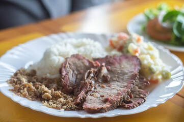 homemade food and hump steak Brazilian meat, natural light and copy space