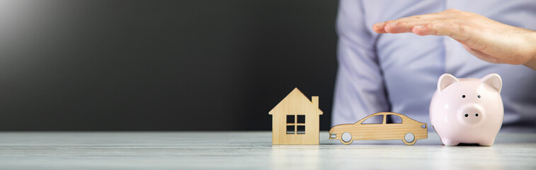 man saving money for home and car