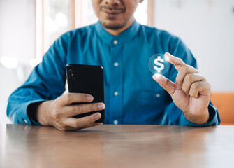 Successful international financial investment concept with business person holding glowing dollar sign growth, charts and dollar sign, digital technology