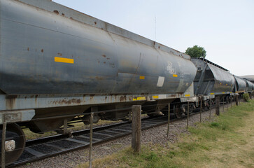 Fototapeta na wymiar freight train with many wagons passes