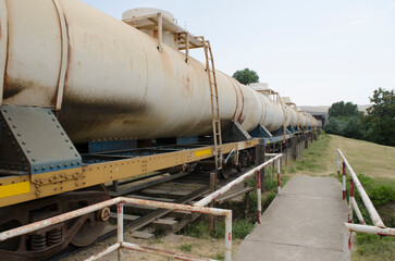 Fototapeta na wymiar fuel freight train, running but rusty