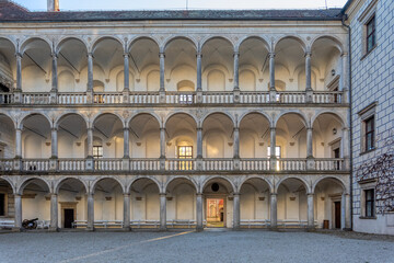 Naklejka premium The arcade in historical castle complex in old town of Jindrichuv Hradec city. It is the third largest castle complex in the Czech Republic