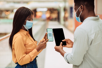 Guy Scanning Visitor's Qr Code On Entrance To Public Place