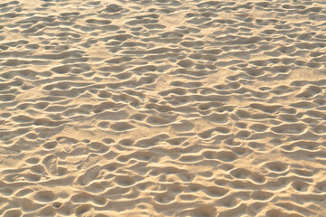 Fine beach sand in the summer sun