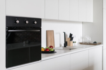Modern black oven in Nordic style interior design