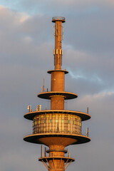 Telecommunications tower at Gey Germany in the evening sun - obrazy, fototapety, plakaty