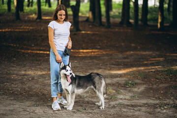 Girl with her dog in park