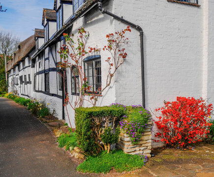 England UK. Traditional houses and cottages in an English Village. Suitable for articles on housing market, finance, mortgage, cost of living etc. Generic property image.