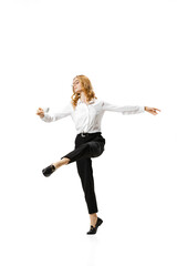 Stylish modern business lady in action, motion isolated on white background. Finance, ballet, art, business, beauty concept. Contemp dancers