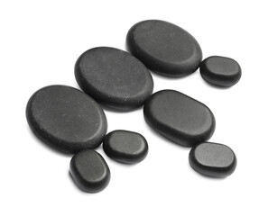 Group of black stones on white background