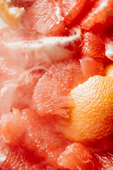close up of grapefruit and smoke