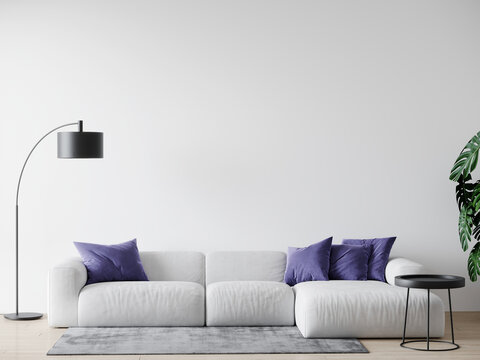 White living room with empty walls and large sofa. Cozy house interior design. Accent details of the trendy tone 2022 - very peri color pillows textile. 3d rendering
