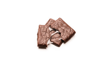 Dark chocolate candies isolated on white background.