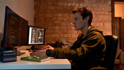 IT developer programming code for mining at home