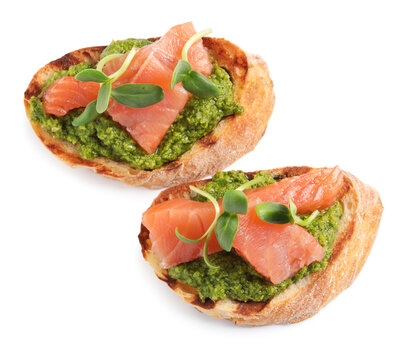 Delicious Bruschettas With Salmon, Pesto Sauce And Microgreens On White Background, Top View