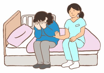 Fototapeta premium ショックで号泣している入院中の統合失調症患者に寄り添い傾聴する精神科看護師