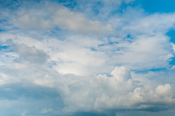 Dramatic white clouds against blue sky. Daylight, cloudy day. Nature, freedom and peaceful concept