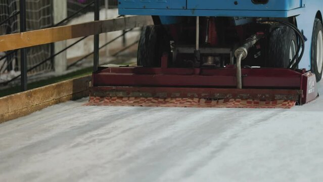 machine levels the ice on the rink close-up
