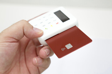Credit and debit card machine for purchases.