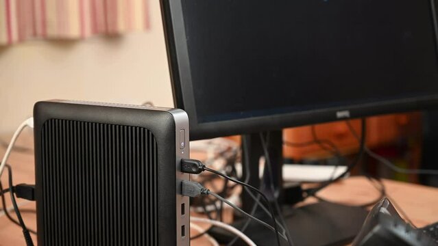 A mini PC is switched on