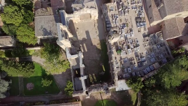 Flight of doves overflying ruined cathedral