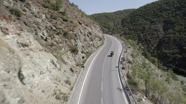 Video with Drone "follow me" on an 800cc trail bike on the SH22 road, albania, Valbone area. Adventurous nomad driver appreciated.