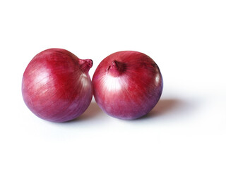 two whole red onion bulbs close-up isolated on white backgroun