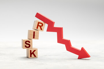 Fall risk. Red down arrow as a symbol of crisis or risky investment