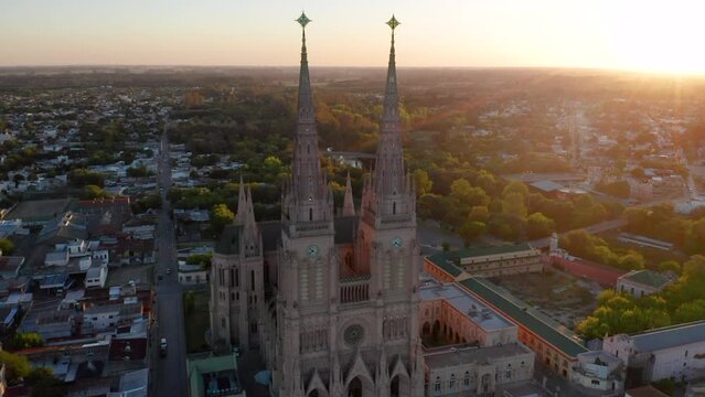 Neogothic Structure Of Lujan Basilica At Dusk In Buenos Aires, Argentina. - aerial