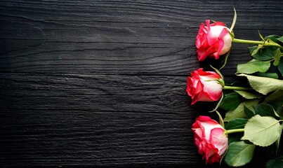 Fototapeta na wymiar red rose on wooden background