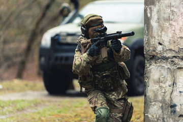 Gutsy heroic female mom soldier going all in at her job . High quality photo