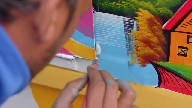 Close-up of artist painting water lake
