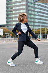 Portrait of business african american girl in fighting pose. Hard business concept