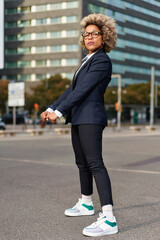 Portrait of business african american girl in fighting pose. Hard business concept