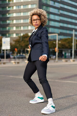 Portrait of business african american girl in fighting pose. Hard business concept