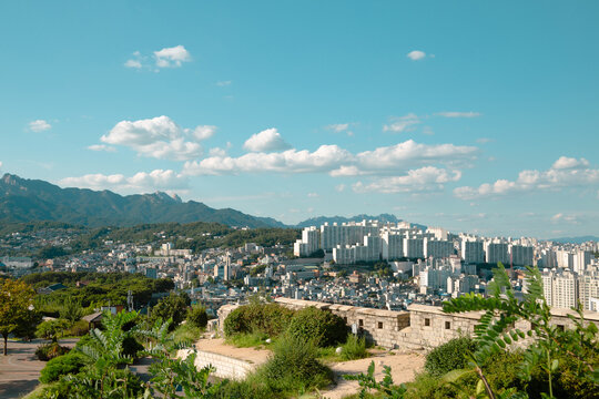 Panoramic view of Naksan Park fortress and mountain and Seongbuk-gu downtown in Seoul, Korea