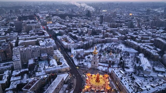 Skyline Kyiv Ukrain, Saint Sophia Cathedra and Sofiyivska Square in Kyiv during christmas market in the winter revealing the kyiv city skyline