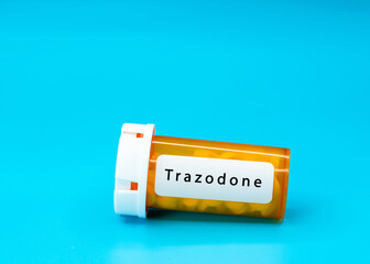 Trazodone Medical vial with pills. Medical pills in orange Plastic Prescription. most popular...